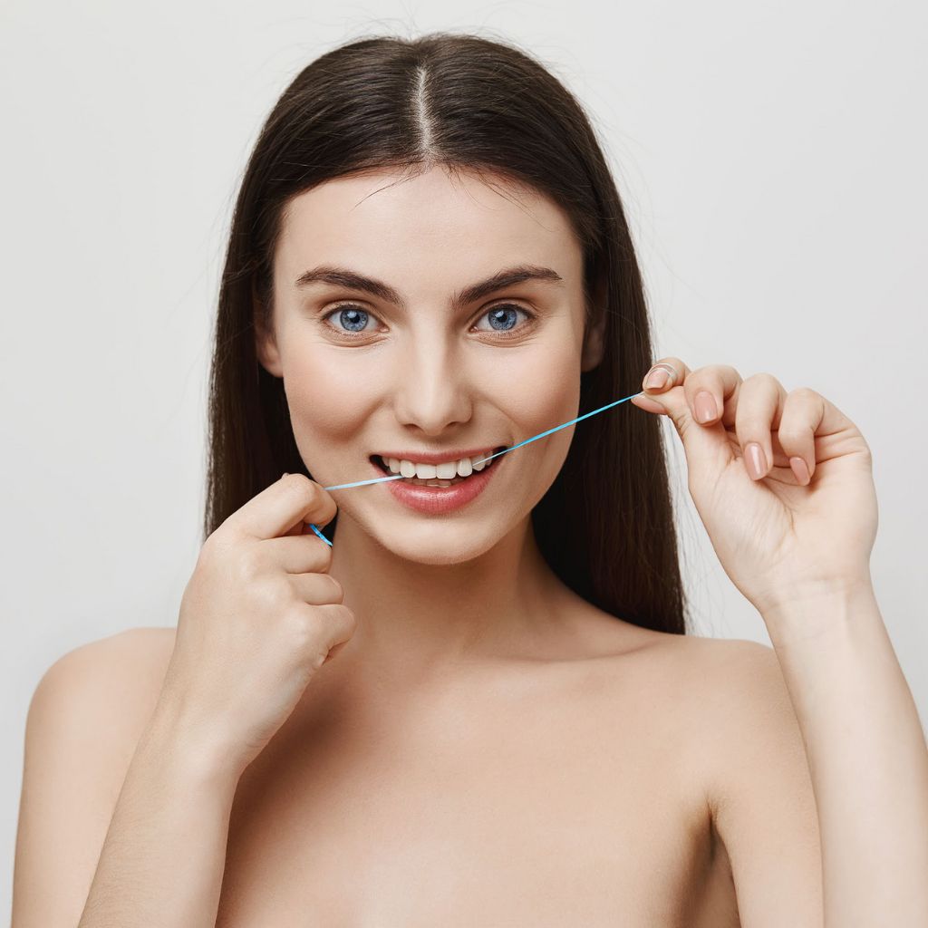 Quais são os Benefícios do Uso de Fio Dental? Essencial para a Saúde Bucal